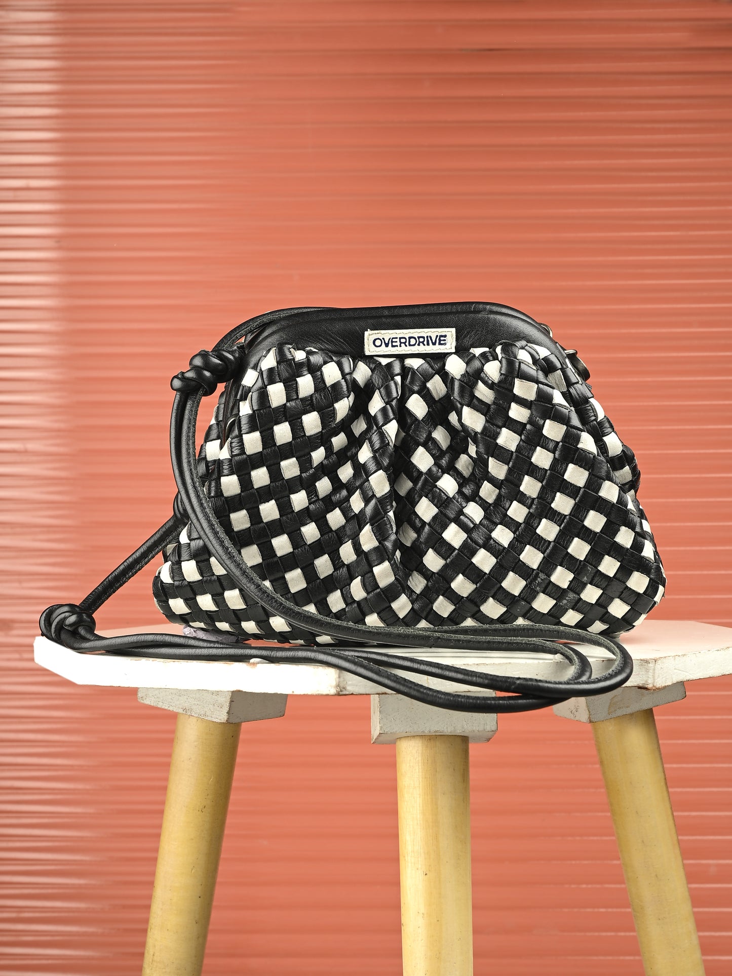 Noir Weave Back & White Leather Sling Bag